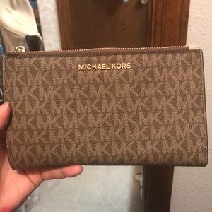 Slightly used michaels kors clutch wallet